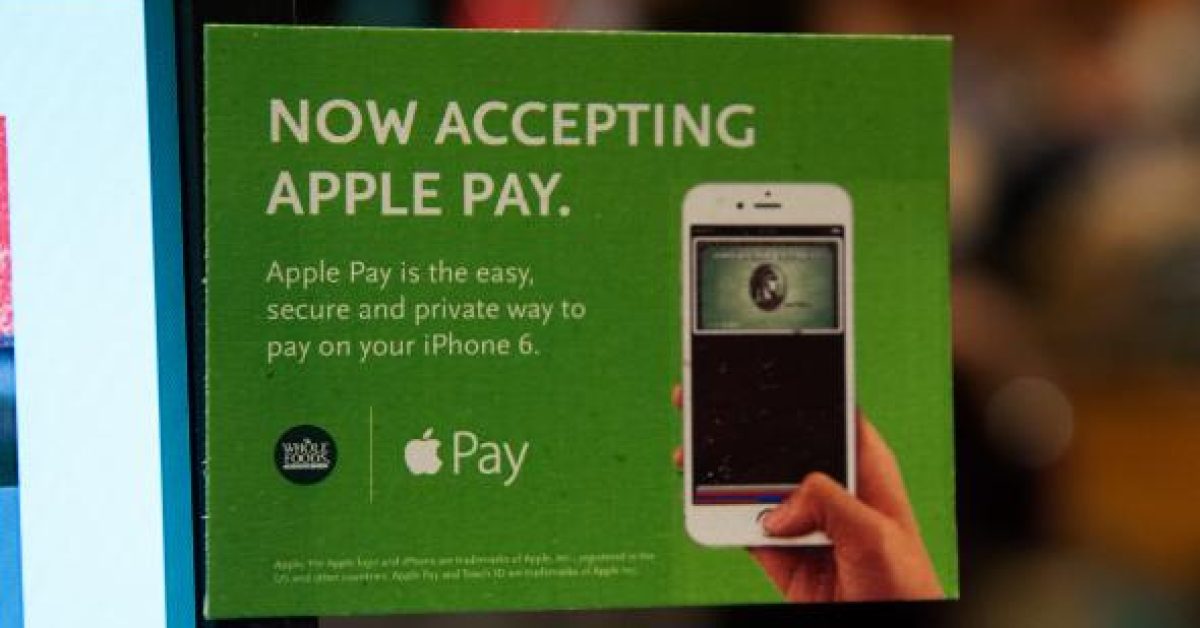 457553182-apple-pay-is-promoted-on-signs-placed-at-the-cash.jpg.CROP.promo-mediumlarge