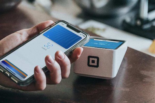 Apple Wallet iphone in hand