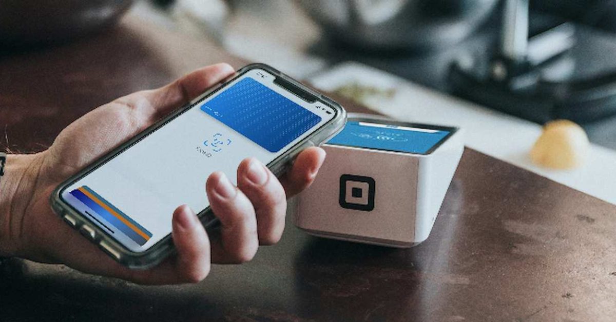 Apple Wallet iphone in hand