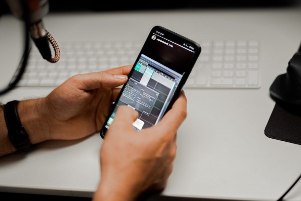holding iphone