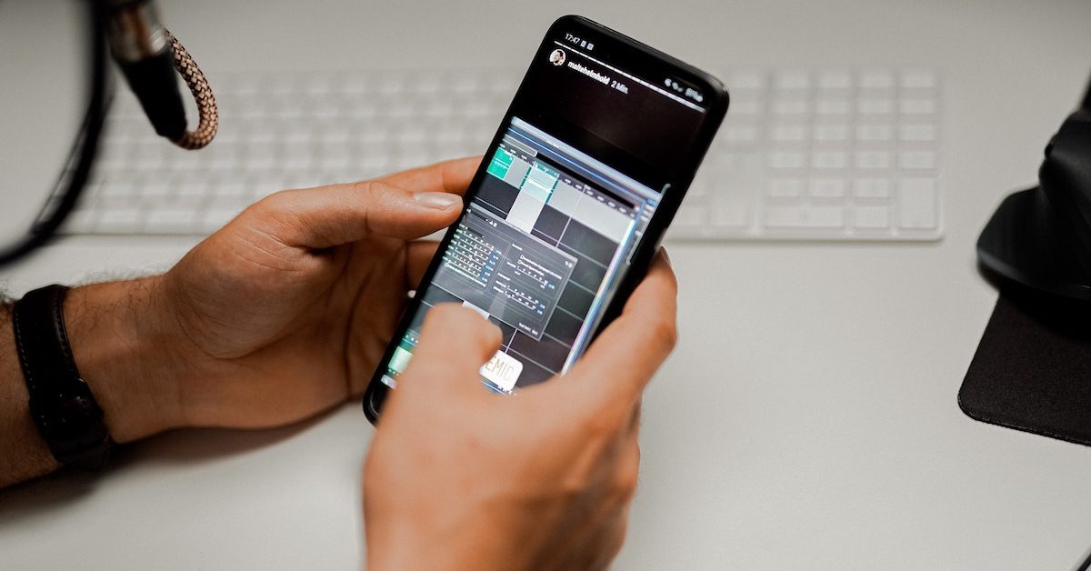 holding iphone