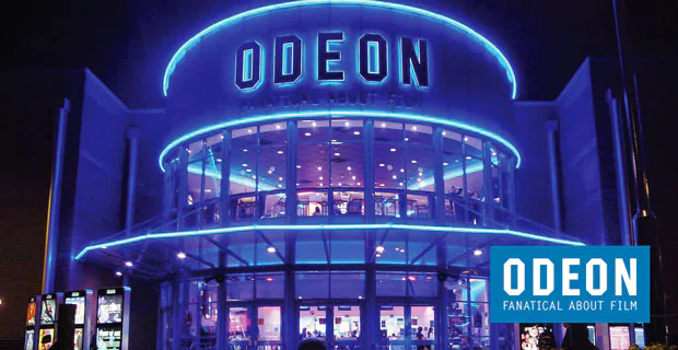 Odeon cinema entrance illuminated at night