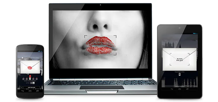 Burberry Kisses campaign displayed across a laptop, phone and tablet
