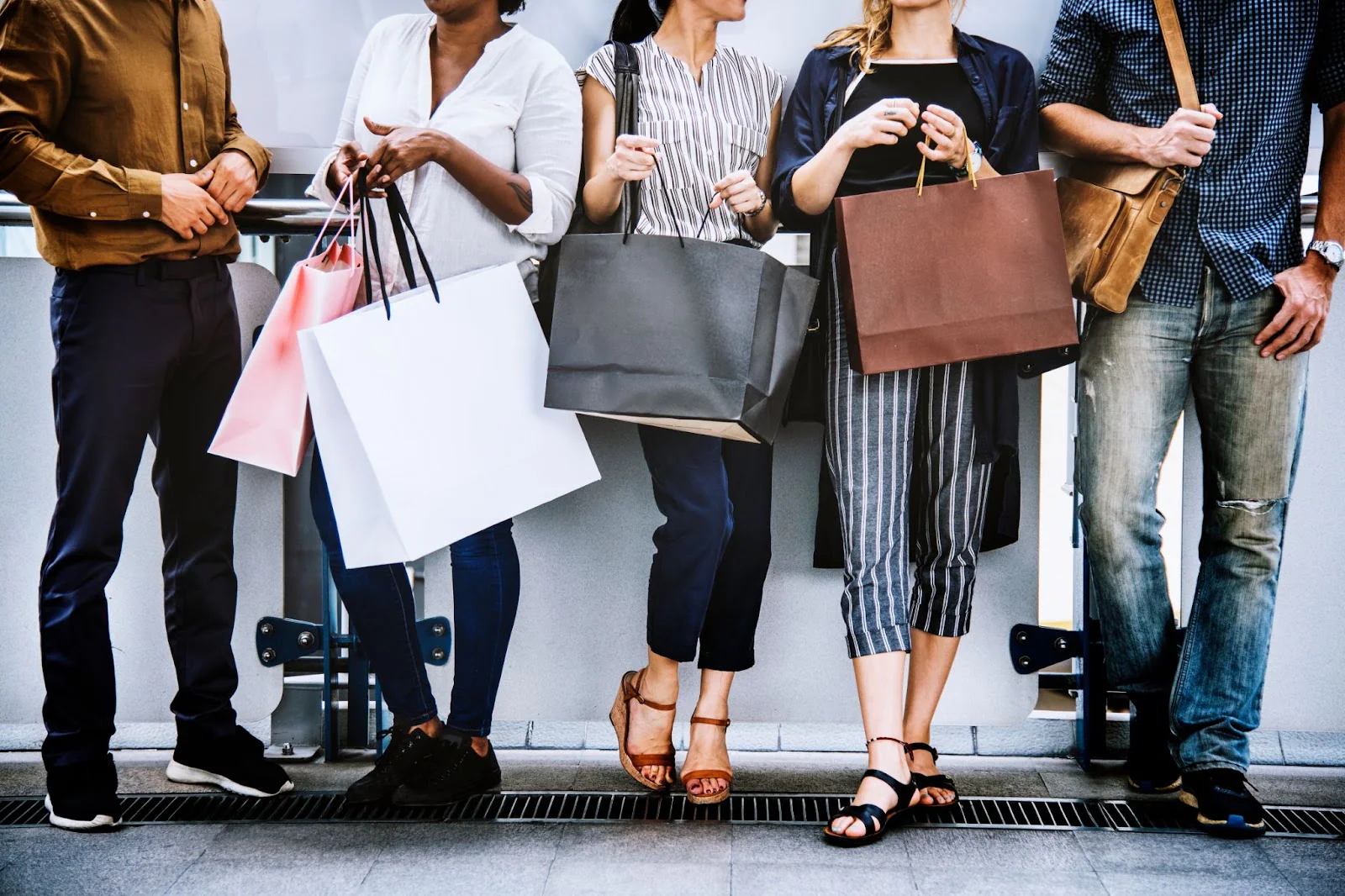 Shoppers carrying retail bags