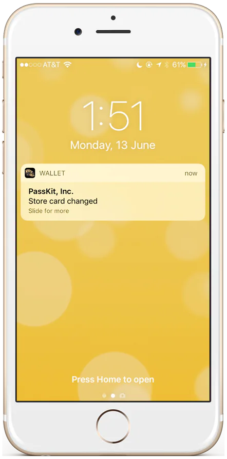 iOS 10 lock screen displaying a Wallet pass-change notification
