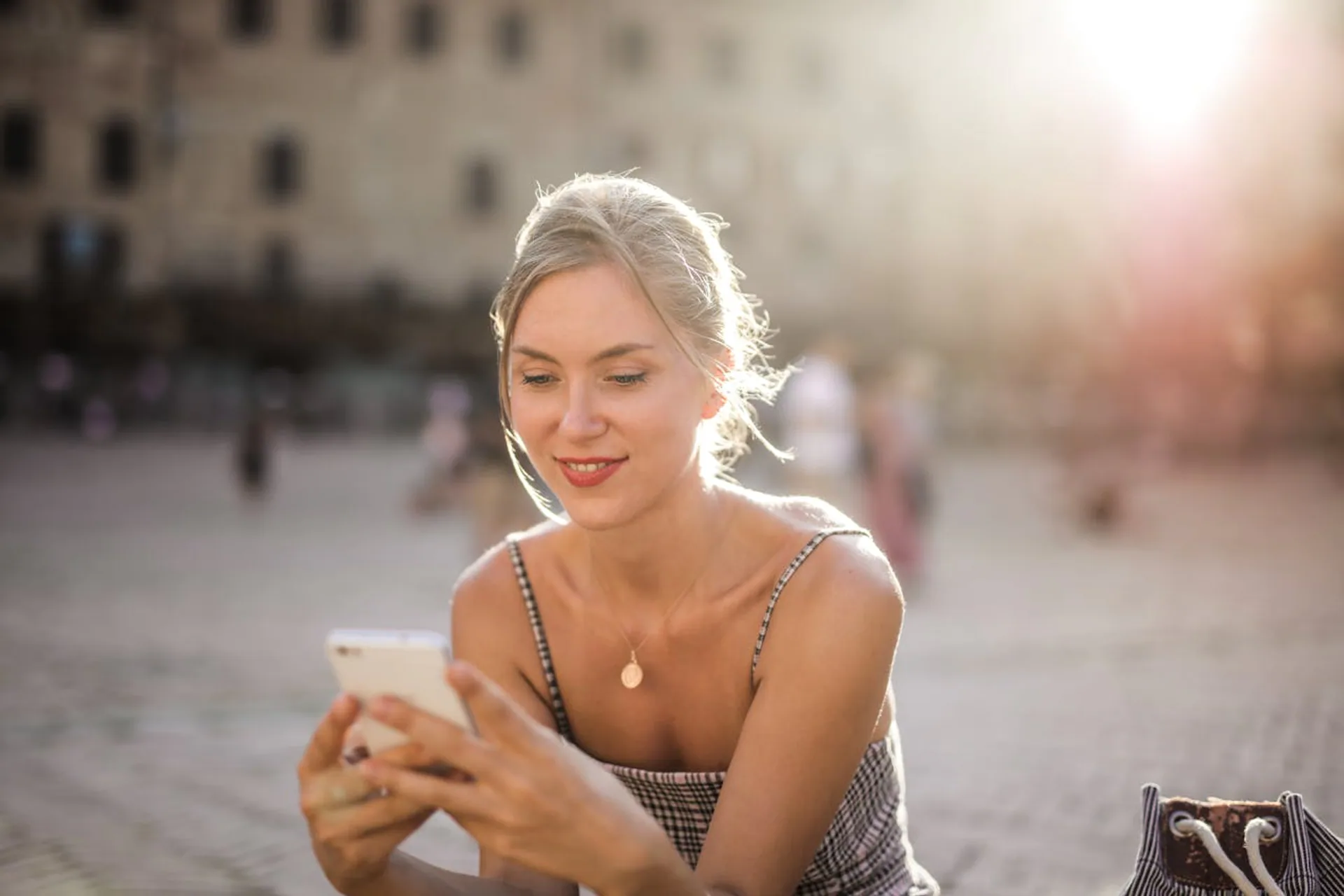 Woman using a smartphone outdoors