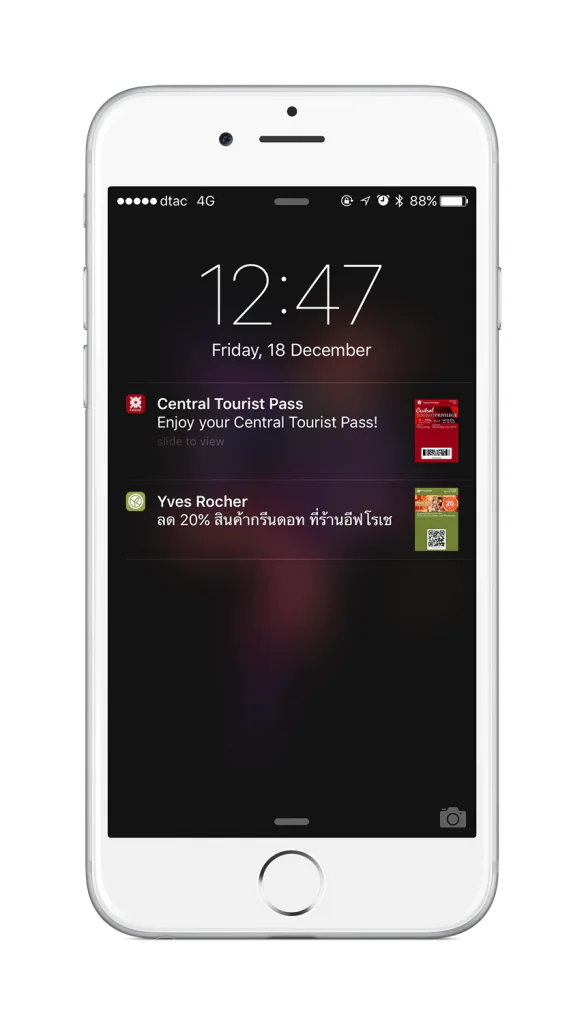 iPhone lock screen with Central Tourist Pass and Yves Rocher notifications