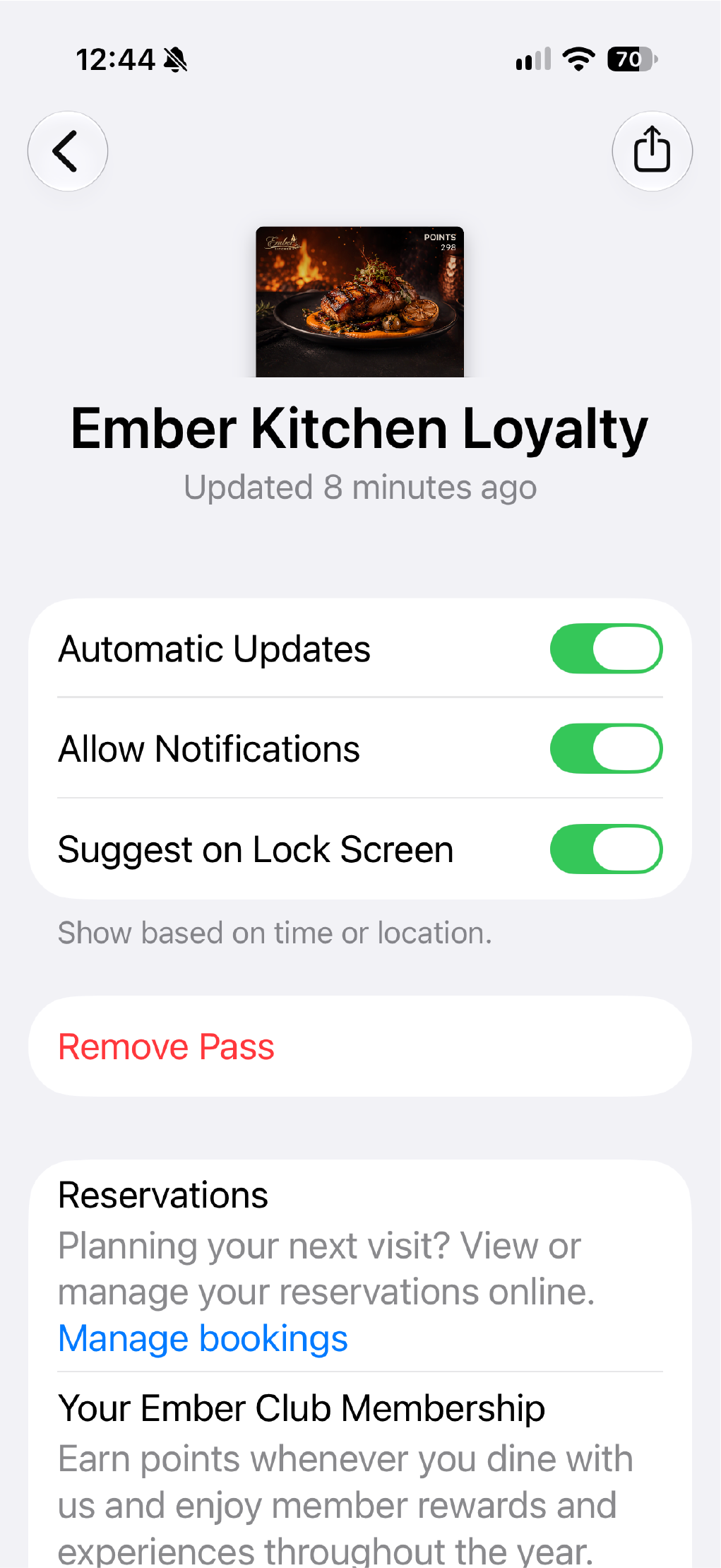 An Ember Kitchen loyalty pass details screen with guest service links.