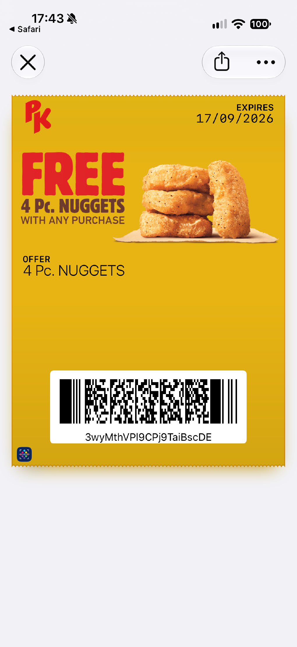 A coupon pass shown on an iPhone screen.